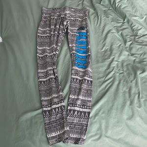 Like new Carolina Panthers grey aztec print leggings size small